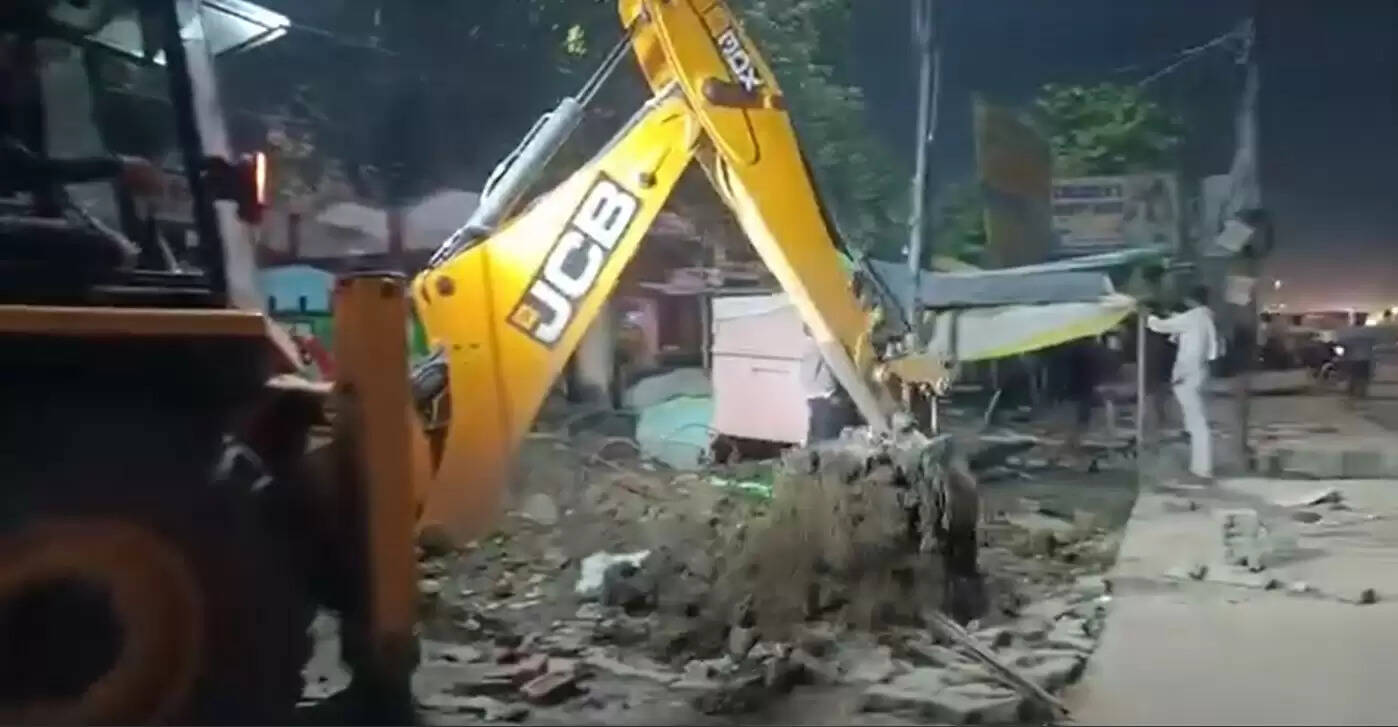 Police run bulldozers