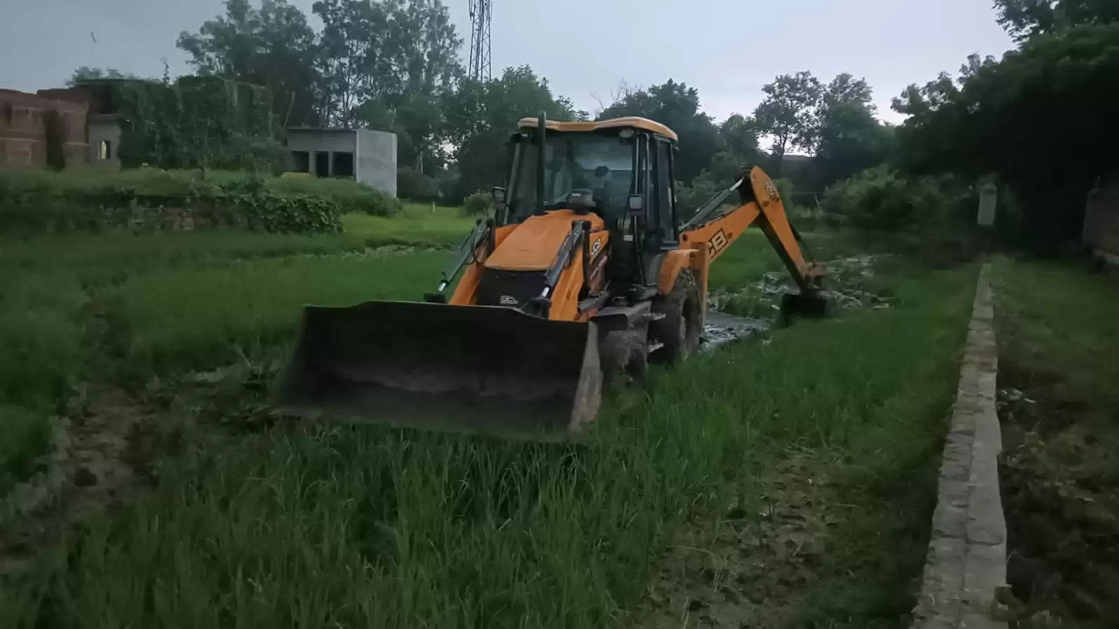 Bulldozer on sports ground 