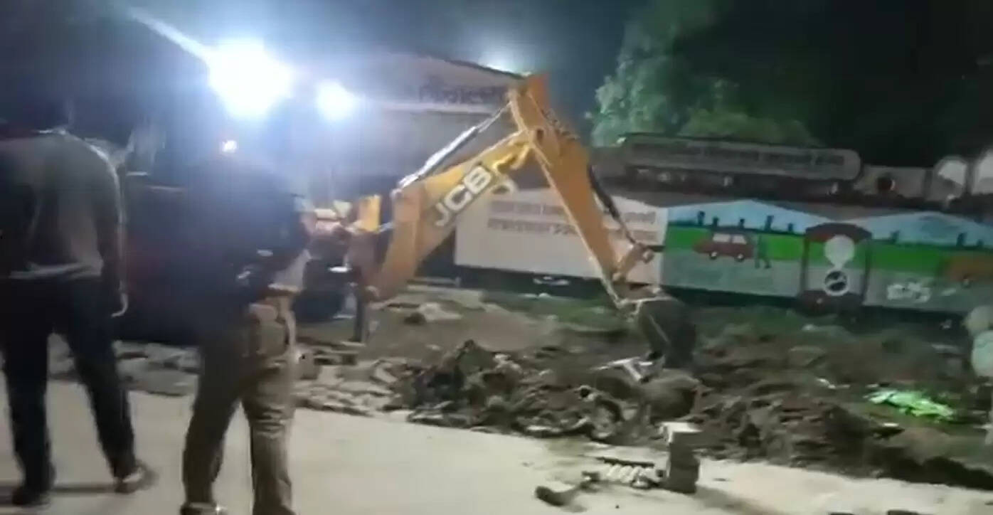Police run bulldozers