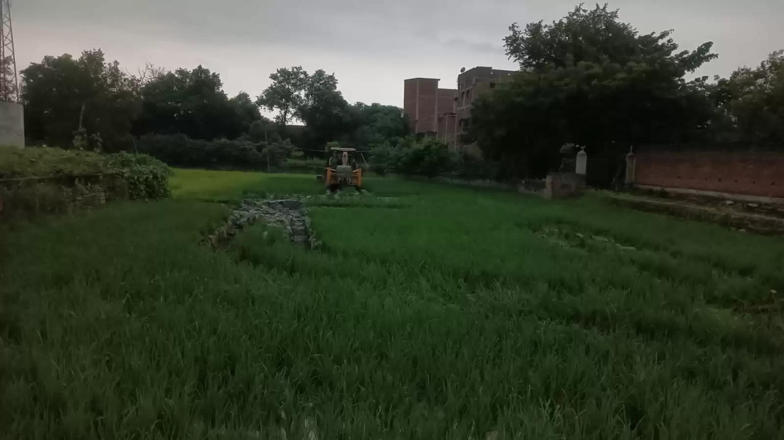 Bulldozer on sports ground 