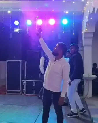   celebratory firing video chandauli  BDC member firing viral video  police investigation celebratory firing UP  wedding firing incident chandauli